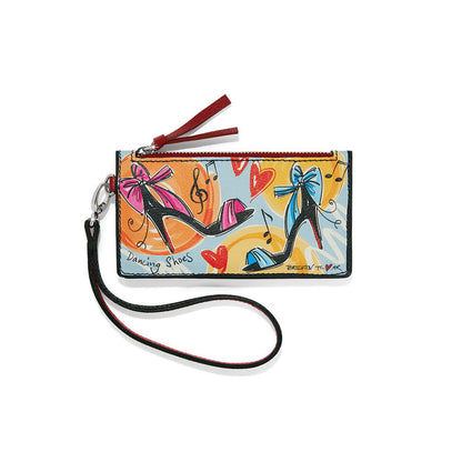 Brighton zip card case with illustrated high heel print, red tassel, and black wristlet strap on a white background