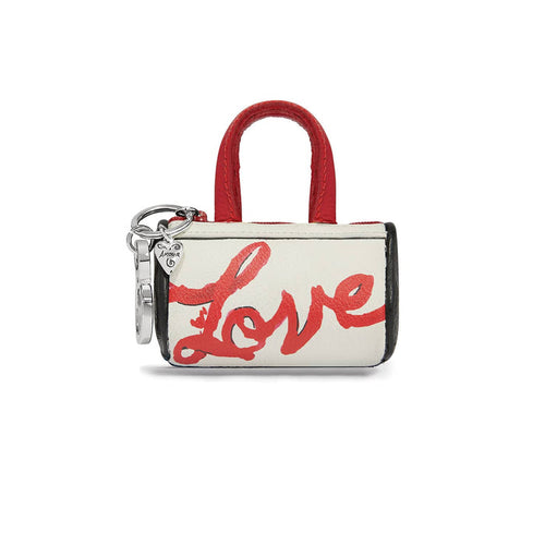 Brighton mini leather handbag charm with red script Love print, red handles, and silver-tone keyring on a white background