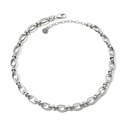 Brighton necklace with silver-plated oval link chain, lobster clasp, and small medallion charm on a white background