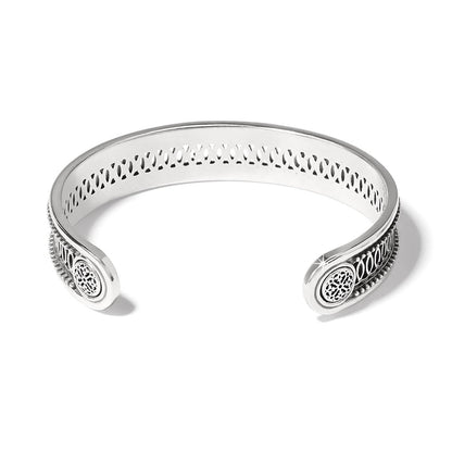 Brighton silver-plated cuff bracelet with filigree medallion ends and decorative openwork side detailing on a white background