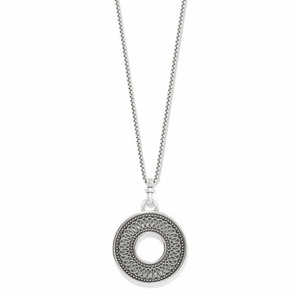 Brighton pendant necklace with silver-plated circular openwork medallion and beaded detail on a white background
