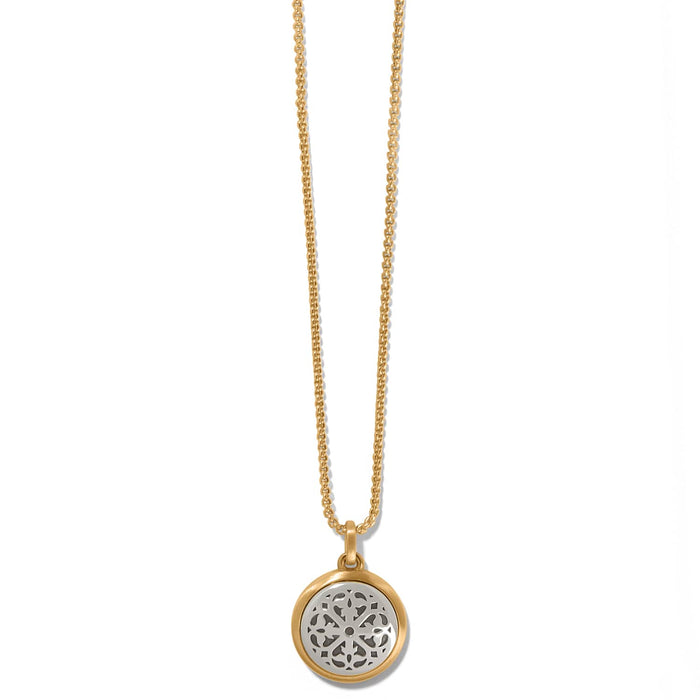 Brighton pendant necklace with brushed gold-plated chain and silver-plated round openwork medallion on a white background