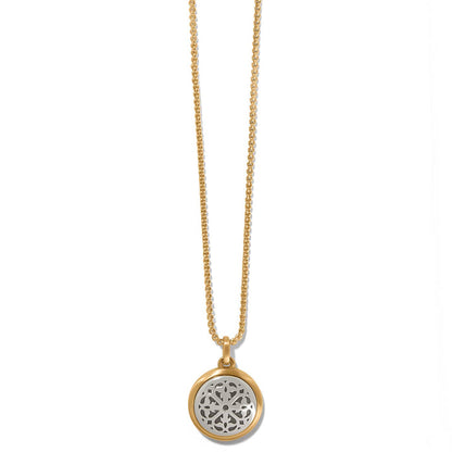 Brighton pendant necklace with brushed gold-plated chain and silver-plated round openwork medallion on a white background