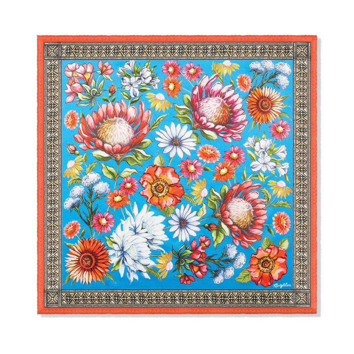 Brighton silk scarf with floral print of proteas, poppies, and daisies on blue with orange border on a white background
