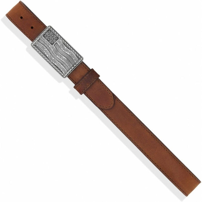 Brighton brown leather belt with silver-tone American flag engraved buckle and stitched edges on a white background