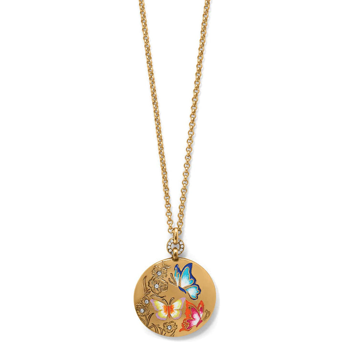 Brighton pendant necklace with gold-plated disc featuring enamel butterflies, floral engraving, and crystal accents on a white background