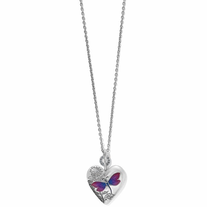 Brighton pendant necklace with silver-plated heart, enamel butterfly, floral engraving, and crystal accents on a white background