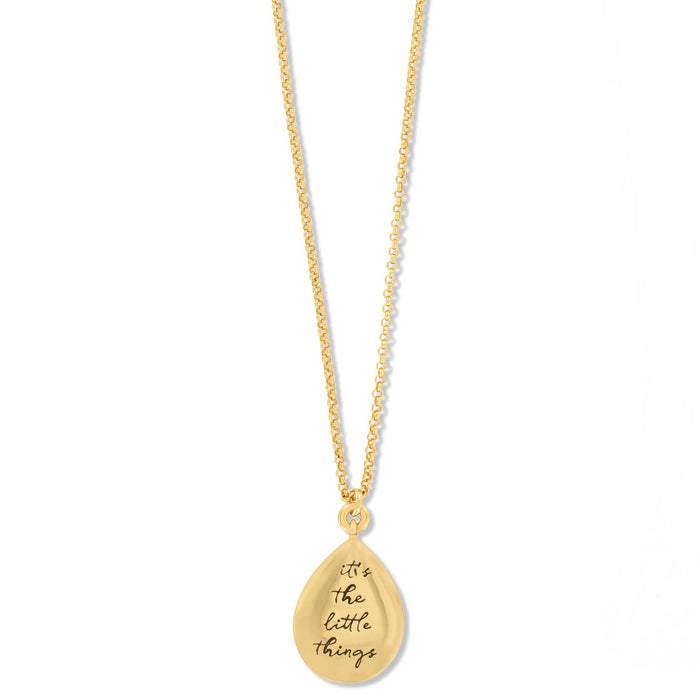 Brighton gold-plated pendant necklace with teardrop charm engraved with the phrase it's the little things on a white background