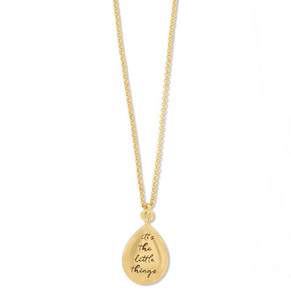 Brighton gold-plated pendant necklace with teardrop charm engraved with the phrase it's the little things on a white background