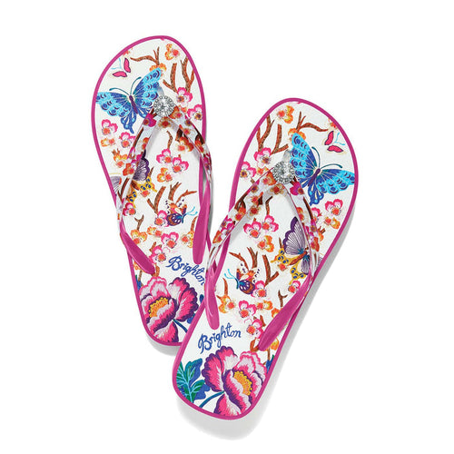 Brighton pink rubber flip-flop sandals with floral and butterfly print and crystal accent on a white background