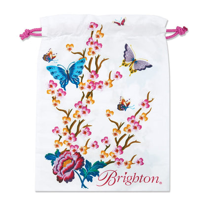 Brighton drawstring pouch with floral and butterfly print, pink cord ties, and script logo on a white background