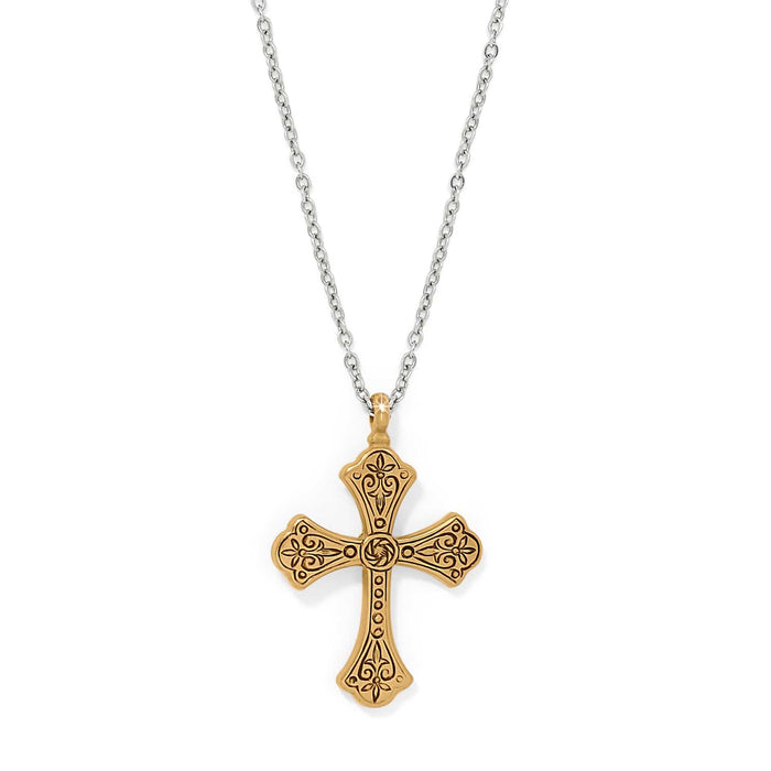 Brighton pendant necklace with two-tone gold cross featuring engraved floral details and silver chain on a white background