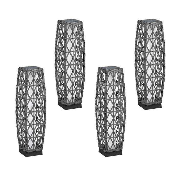 Set of four geometrically patterned vases on a white background