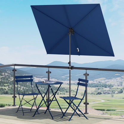 Grand Patio Jena 6x4 ft rectangular flat patio market umbrella in blue, set over a small round table and two chairs.