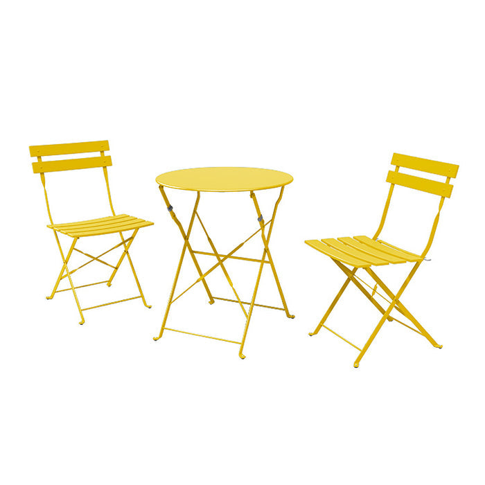 Yellow metal outdoor table and chairs set on a white background