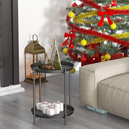 Living room with a decorated Christmas tree, side table, and gift boxes.