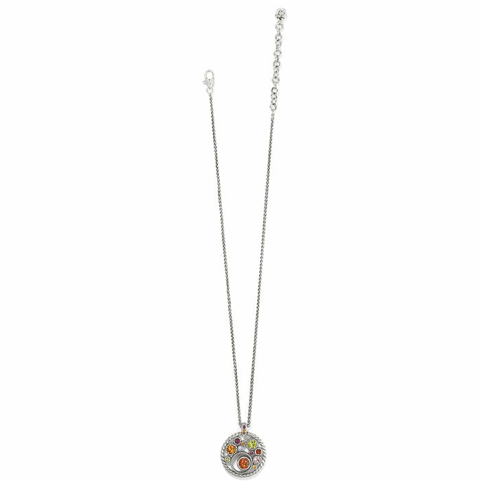 Brighton pendant necklace with silver-plated round pendant featuring multicolored crystals and rope-twist border on a white background