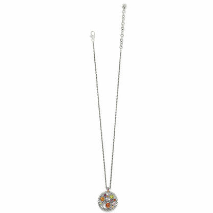 Brighton pendant necklace with silver-plated round pendant featuring multicolored crystals and rope-twist border on a white background