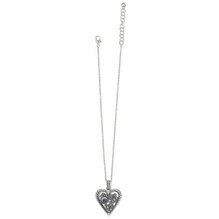 Brighton heart pendant necklace with multicolored crystals, silver-plated rope-edge frame, and extender chain on a white background