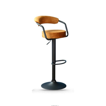 Bar stool with rust coloured cushioned seat and backrest on a white background