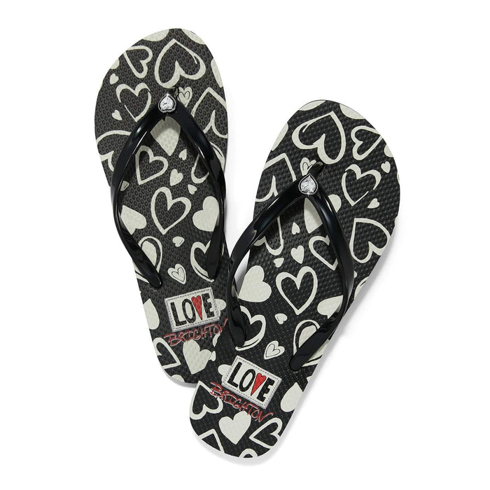 Brighton black rubber flip-flop sandals with white heart print and Love Brighton graphic on a white background