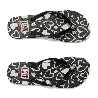 Brighton black rubber flip flop sandals with white heart print and crystal accent on a white background
