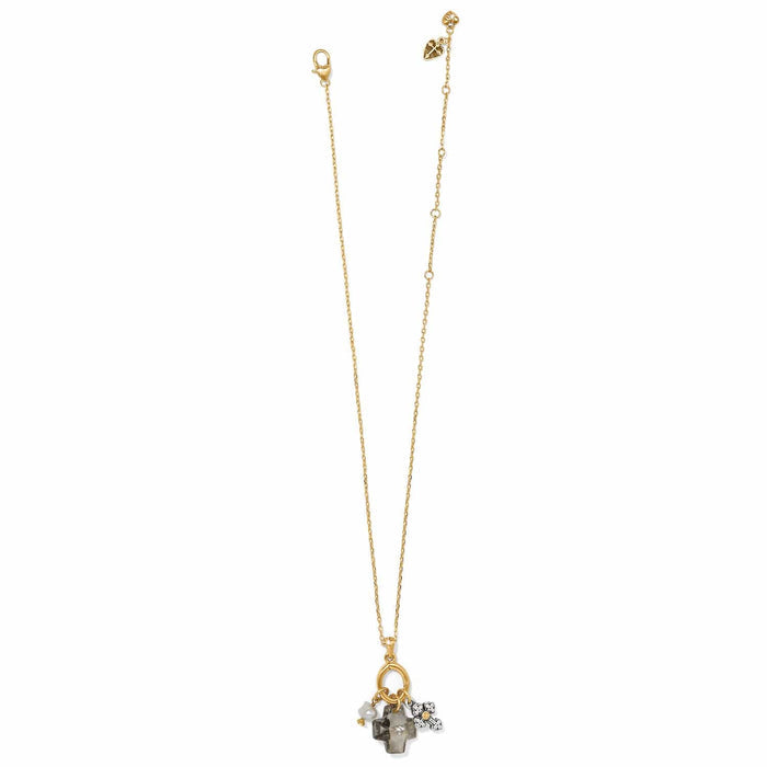 Brighton two-tone pendant necklace with crystal cross, potato pearl, and small silver cross charms on a white background
