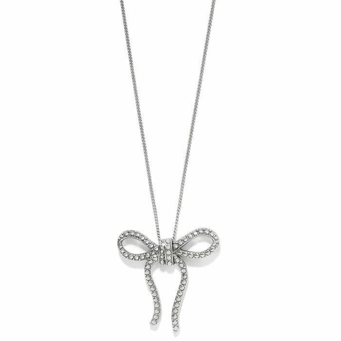Brighton pendant necklace with silver-plated beaded bow design and dangling ribbon ends on a white background
