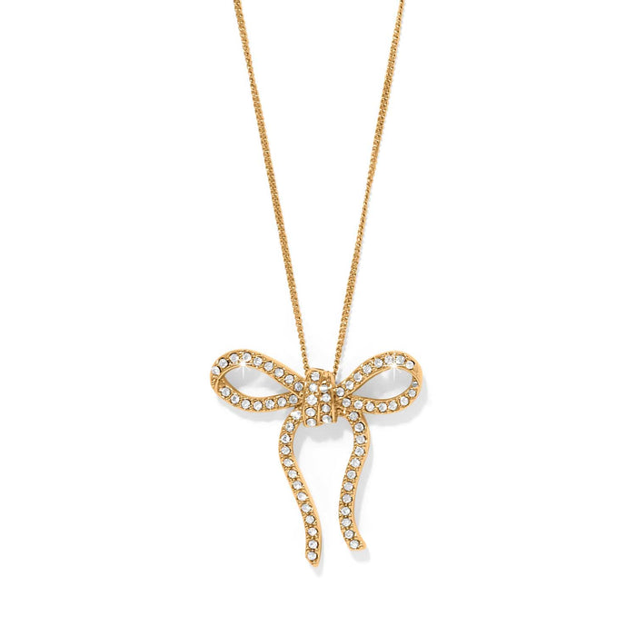 Brighton pendant necklace with gold-plated bow design and crystal accents on delicate chain on a white background