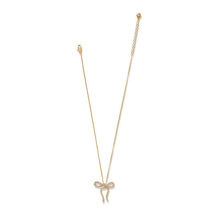 Brighton gold-plated bow pendant necklace with crystal accents and lobster clasp on a white background