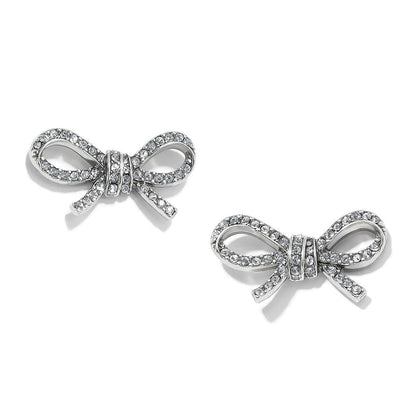 Brighton stud earrings shaped like silver-plated bows with pavé crystal accents and ribbon detailing on a white background
