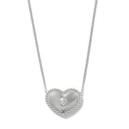 Brighton pendant necklace with silver-plated heart, rope border, and center crystal accent on a white background