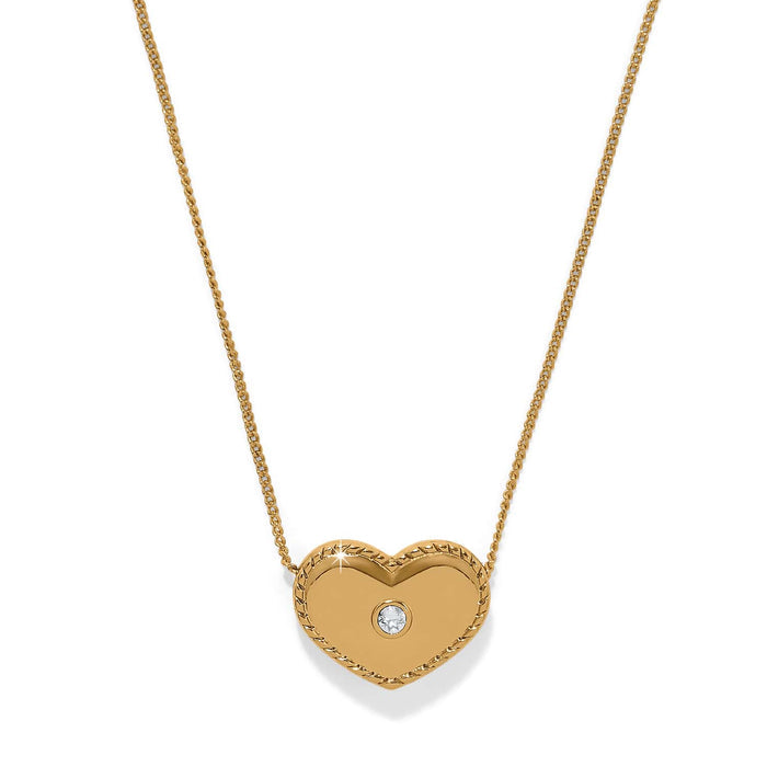 Brighton heart pendant necklace in gold-tone with rope-edge border and single crystal accent on a white background
