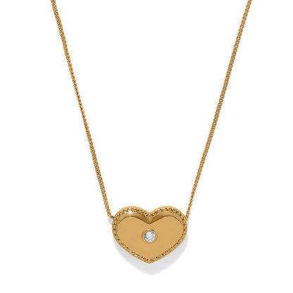 Brighton heart pendant necklace in gold-tone with rope-edge border and single crystal accent on a white background