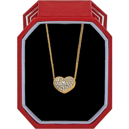 Brighton gold-tone heart pendant necklace with pavé crystals displayed in a red gift box on a white background