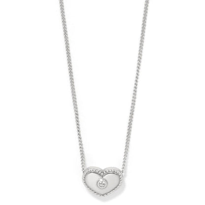 Brighton heart pendant necklace with silver-plated rope-edged heart and center crystal accent on a white background