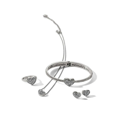 Brighton silver-plated heart jewelry set with bangle, necklace, ring, and stud earrings featuring crystals on a white background