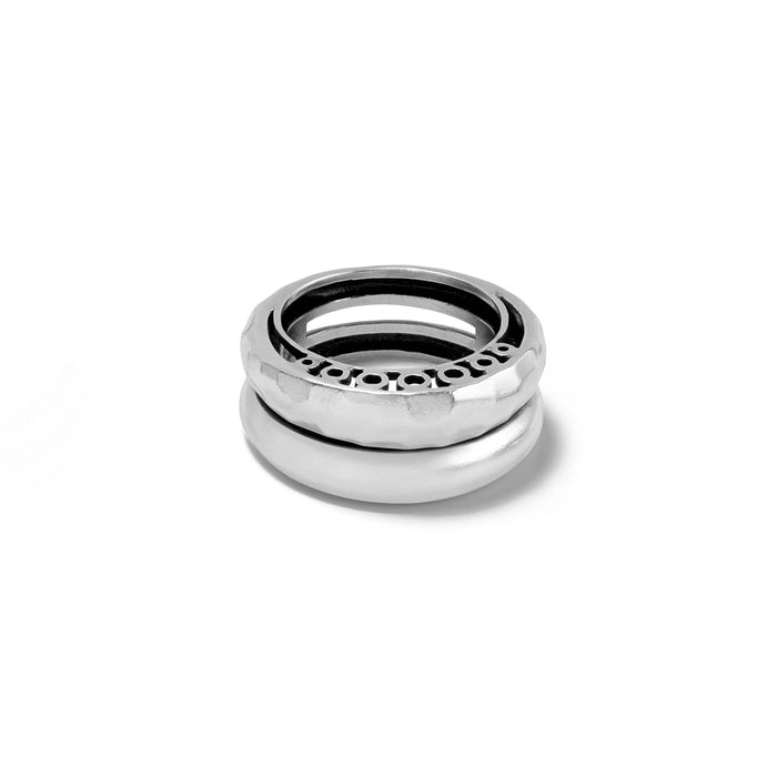 Brighton stacked rings with hammered band, openwork circle detail, and smooth polished silver-plated band on a white background