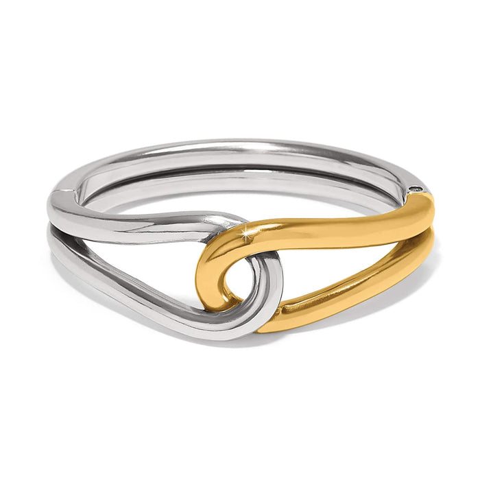 Brighton hinged bangle bracelet with interlocking silver-tone and gold-tone loop design on a white background