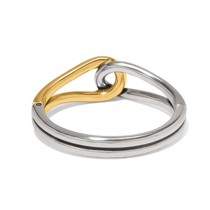Brighton bangle bracelet with interlocking silver-tone and gold-tone loop design in two-tone finish on a white background