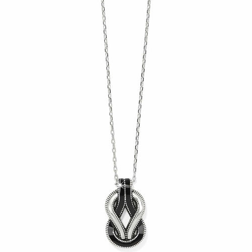 Brighton pendant necklace with silver-plated chain, black enamel accents, and interwoven loop design on a white background
