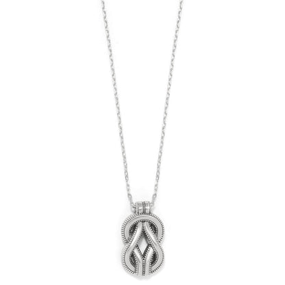 Brighton pendant necklace with silver-plated interwoven knot design and textured detailing on a white background