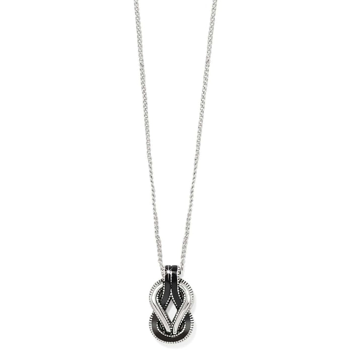 Brighton pendant necklace with silver-plated knot design and black enamel accents on a white background