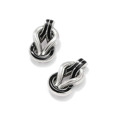 Brighton earrings with silver-plated knotted design and black enamel accents with beaded texture on a white background