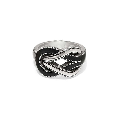 Brighton silver-plated ring with black enamel interlocking knot design and beaded rope detailing on a white background