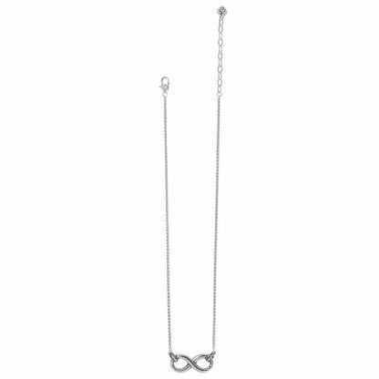 Brighton silver-plated necklace with infinity pendant, delicate chain, and lobster clasp on a white background