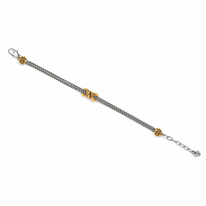 Brighton bracelet with silver-tone chain, gold-tone accent stations, and lobster clasp with extender on a white background