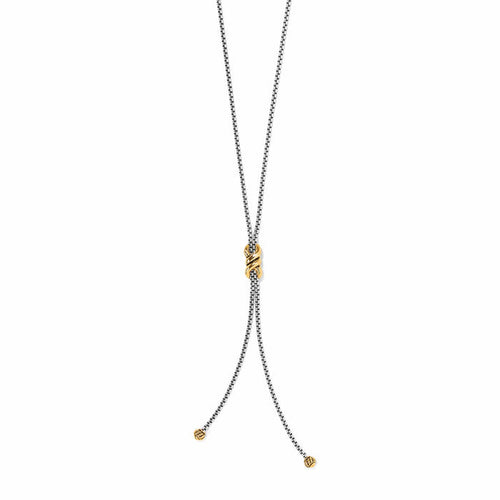Brighton lariat necklace with two-tone box chain and gold-tone X wrap knot centerpiece on a white background