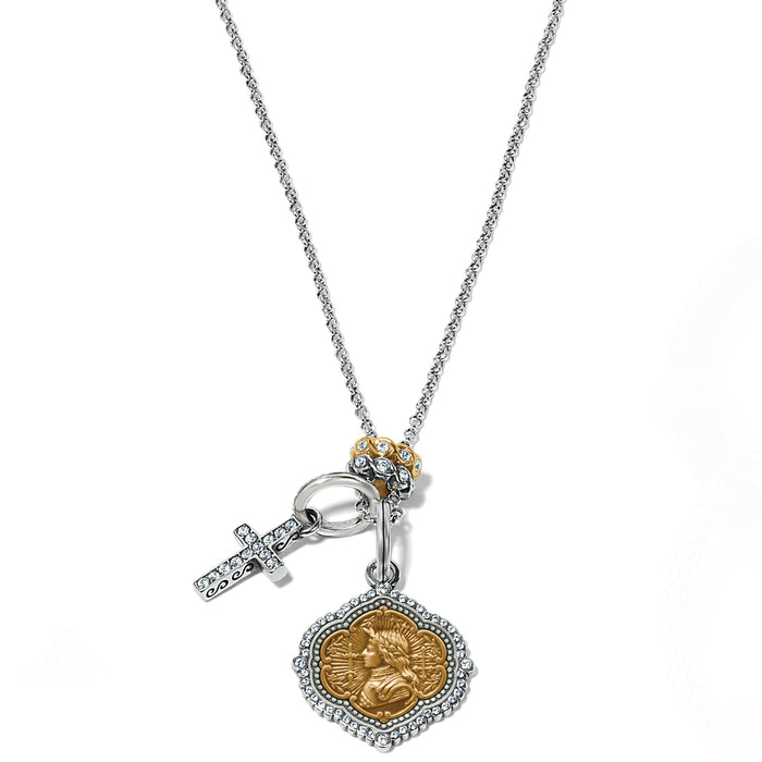 Brighton two-tone charm necklace with crystal cross and gold medallion pendant featuring crystal accents on a white background
