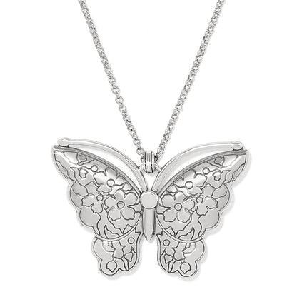 Brighton pendant necklace with silver-plated butterfly featuring engraved floral wing detail and rolo chain on a white background